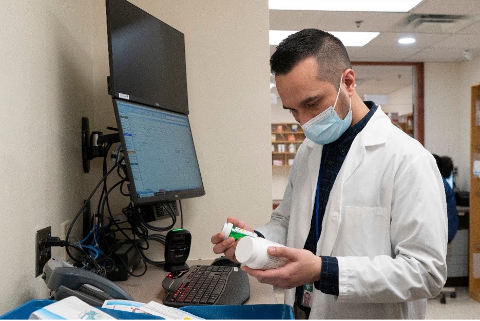 worker at new pharmacy