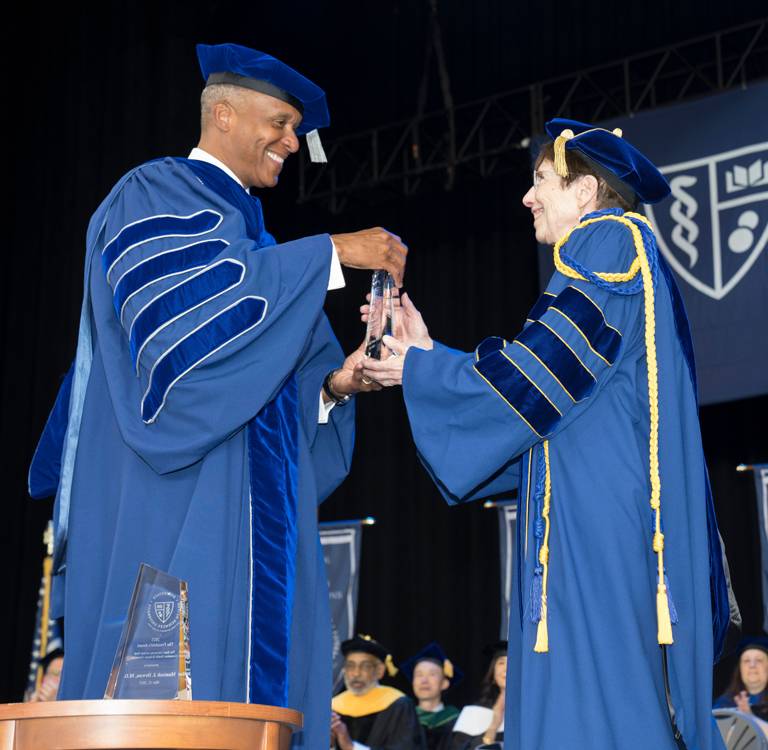 photo of Eva Cramer, Ph.D., on the right