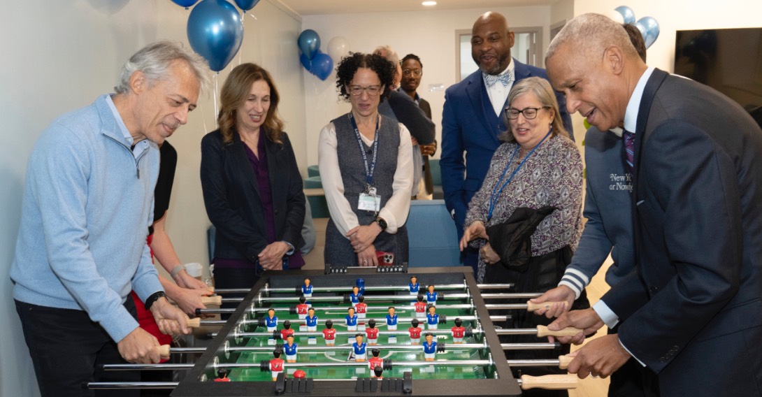 people playing foosball