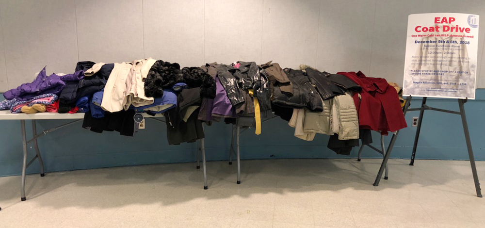 photo of coats on a table