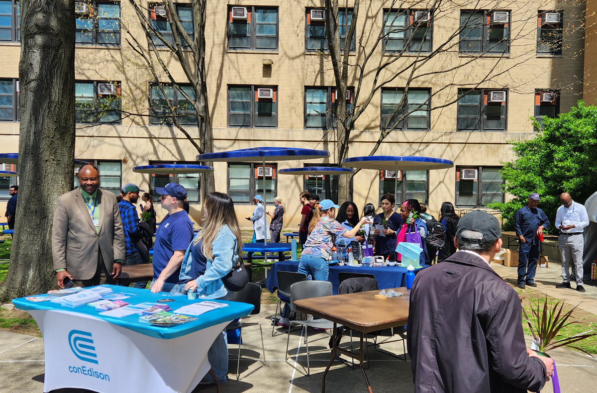 photo of 2025 Earth Day event outside on the Downstate lawn area called The Grove