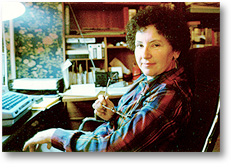 Mildred "Barry" Friedman sitting at her desk.