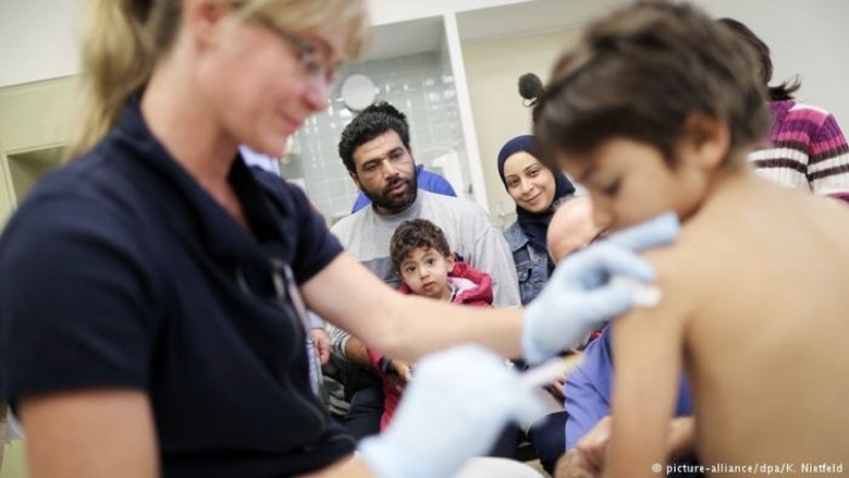 photo of child getting vaccine shot