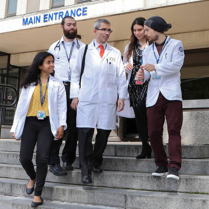 photo of doctors walking and talking