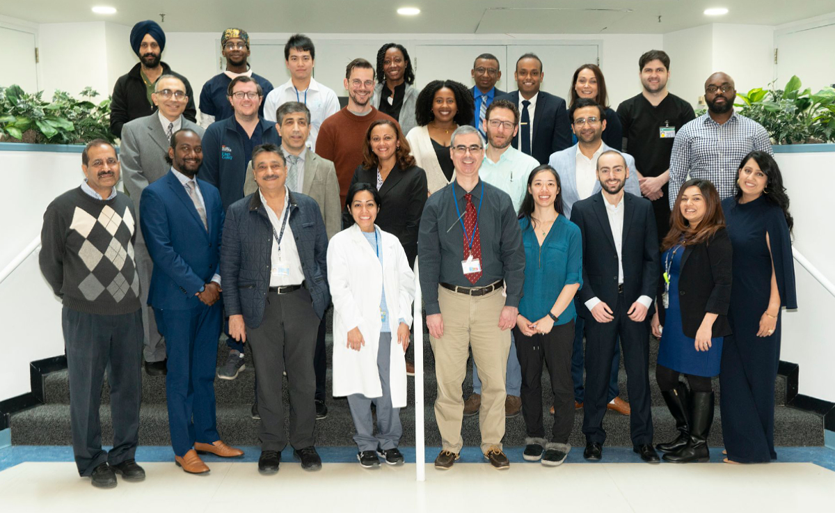 group photo of staff, faculty, and fellows