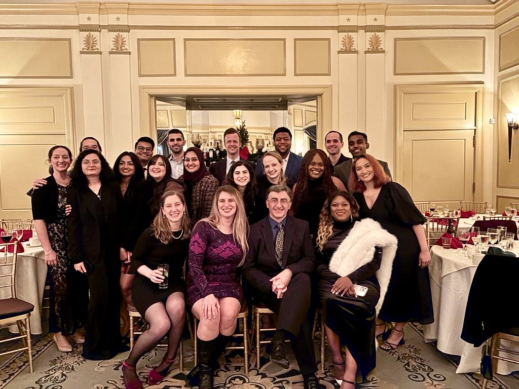 Dr. Kougias and resident group at Holiday dinner 2023