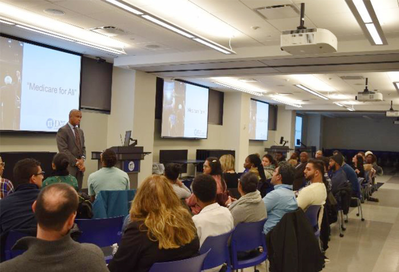 photo of Dr. Riley with students