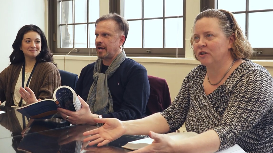 people at a table talking