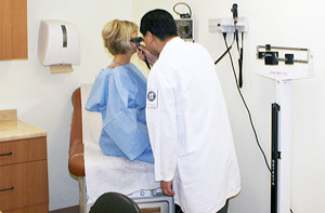 Doctor examining a patient