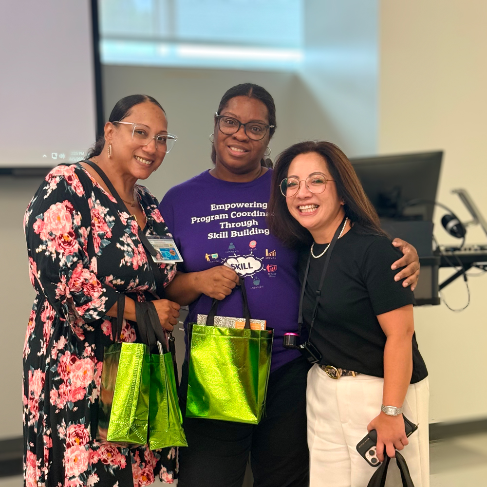 photo of three women together smiling
