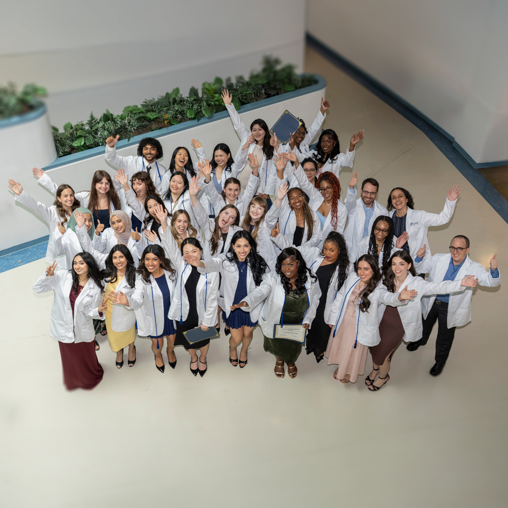 group photo of OT White Coat
